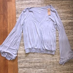 Brand new lilac bell sleeve top